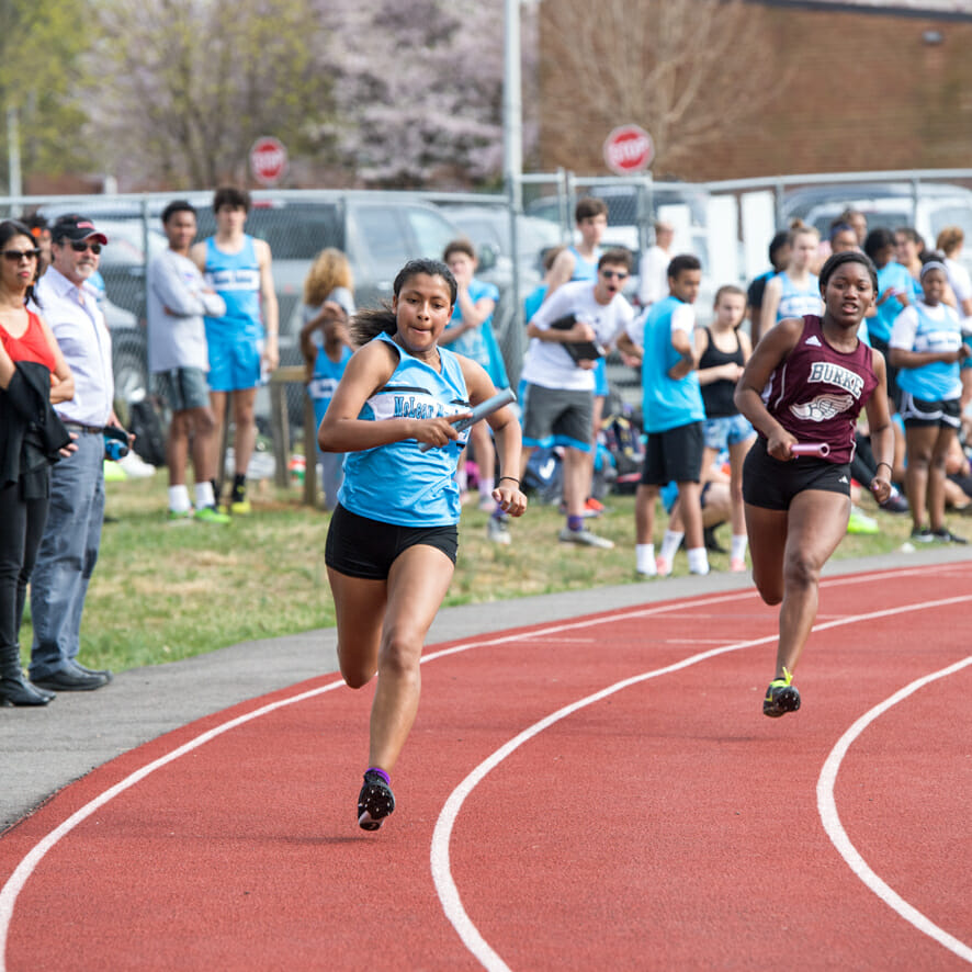 McLean varsity track and field runners on track