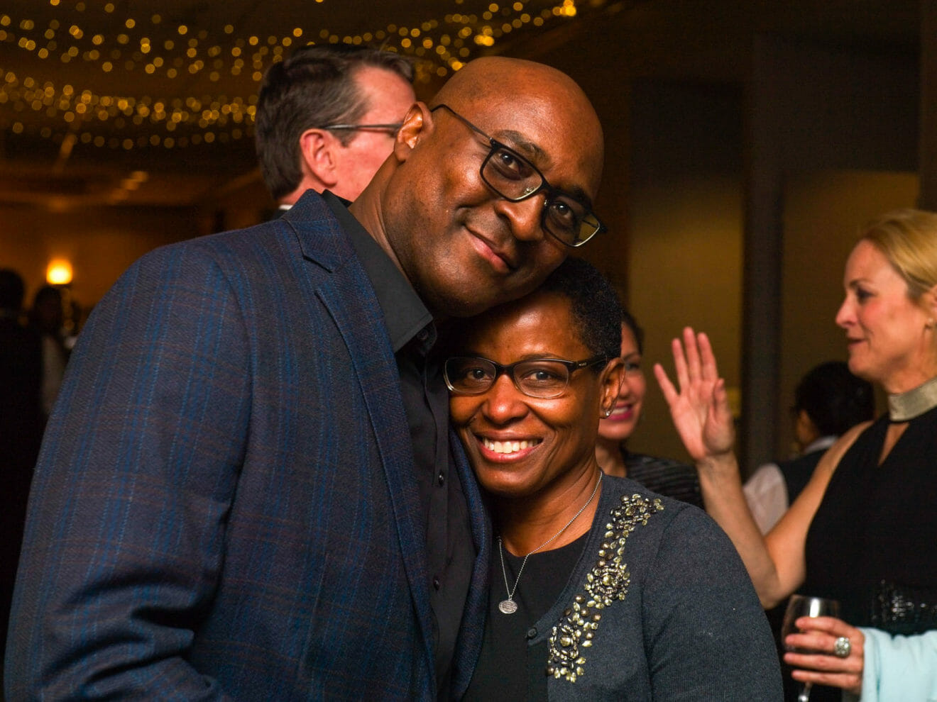 Smiling couple at Parents Association event