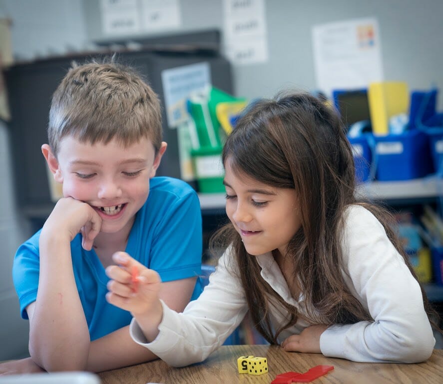 Two students using dice.